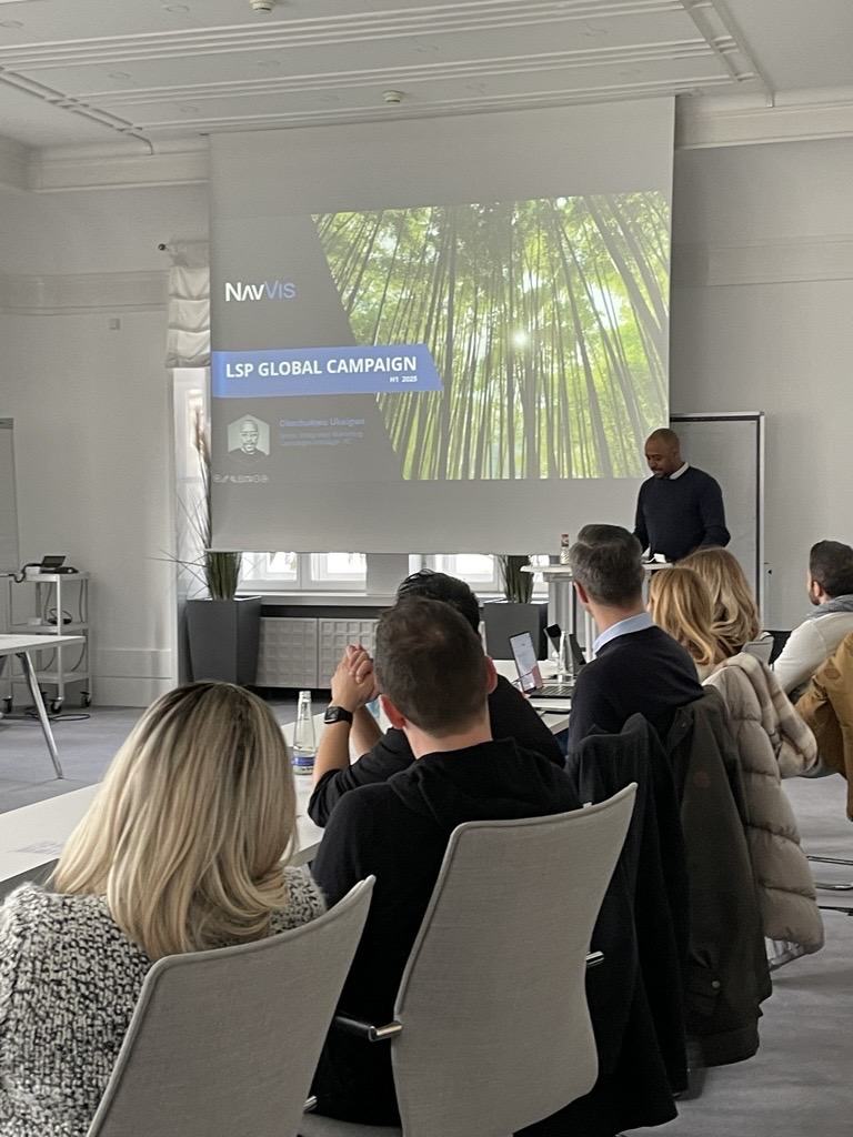 Okey presenting a global campaign plan at sales kickoff in Munich